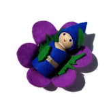 Peg doll fairy in felt flower bed