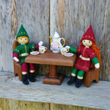Kindness Elf dolls sitting at a table Kindness Tradition