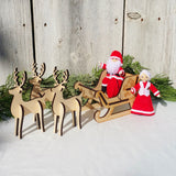 Santa Claus doll with Mrs Claus, wooden sleigh and reindeer