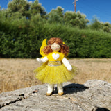 Yellow rainbow fairy doll light brown hair