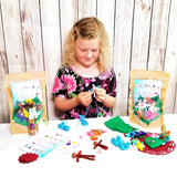 Cute little girl making bendy doll fairy Wildflower Toys craft kit