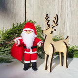 Santa Claus doll with wooden reindeer