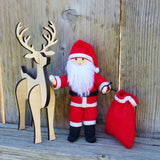 Santa Claus doll with wooden reindeer