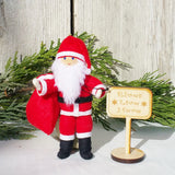 Santa Claus doll with wooden  Kindness Elves sign